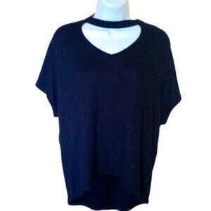 --- Black Short Sleeve Top Size Small but Fits Medium - Large